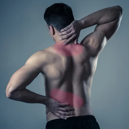 A man reaching to stretching his back and neck. Pain and inflammation is indicated in red.